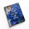 Closed hardcover oil painting-style art book