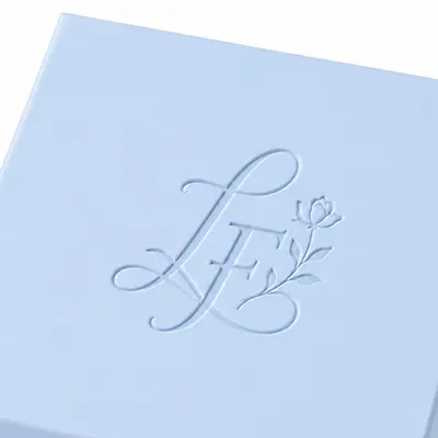 Debossed pressed logo on box