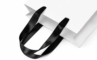 Ribbon handles for custom paper bags